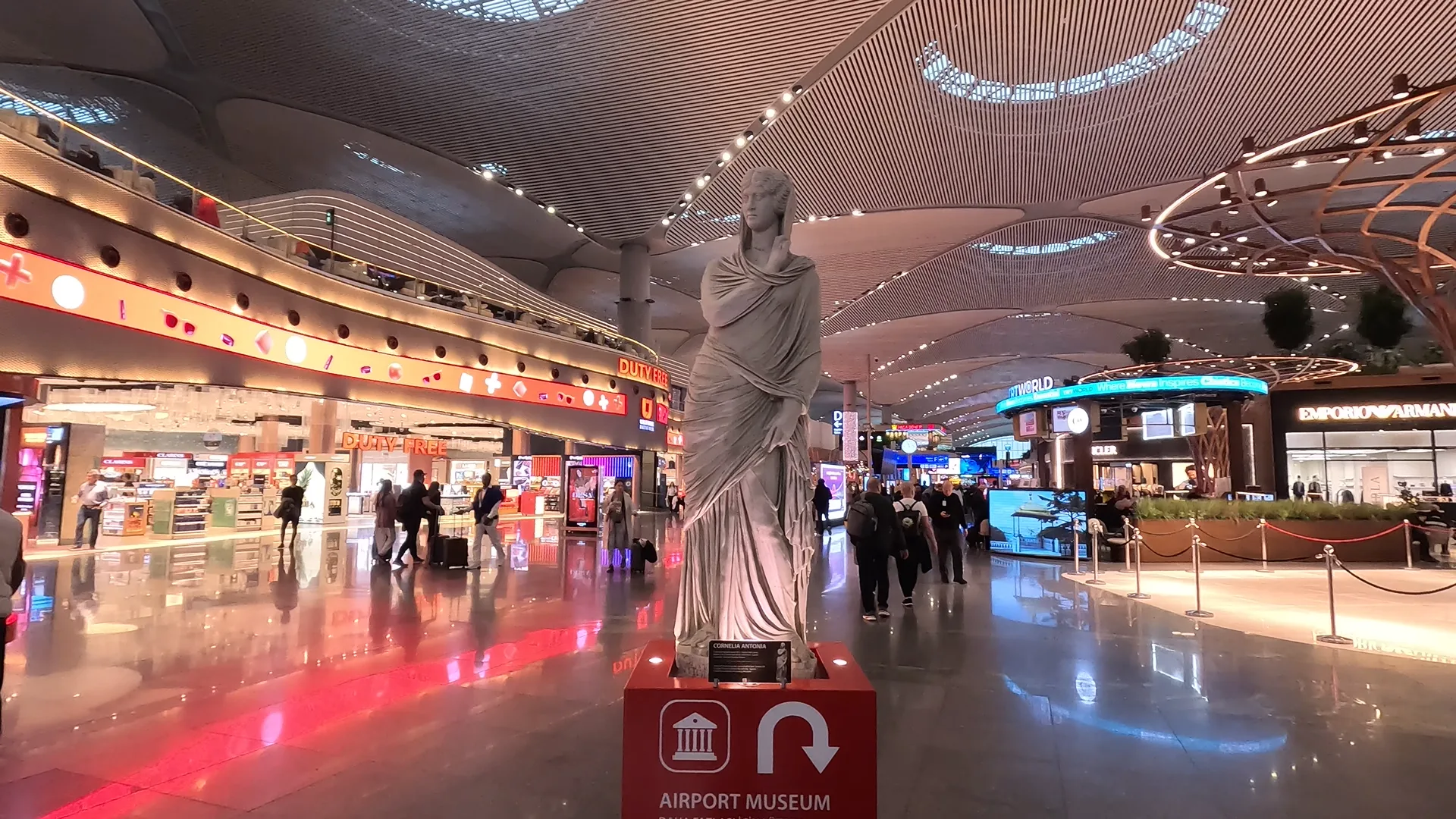 Statue of Cornelia Antonia at Istanbul Airport, showing directions to the Istanbul Airport Museum