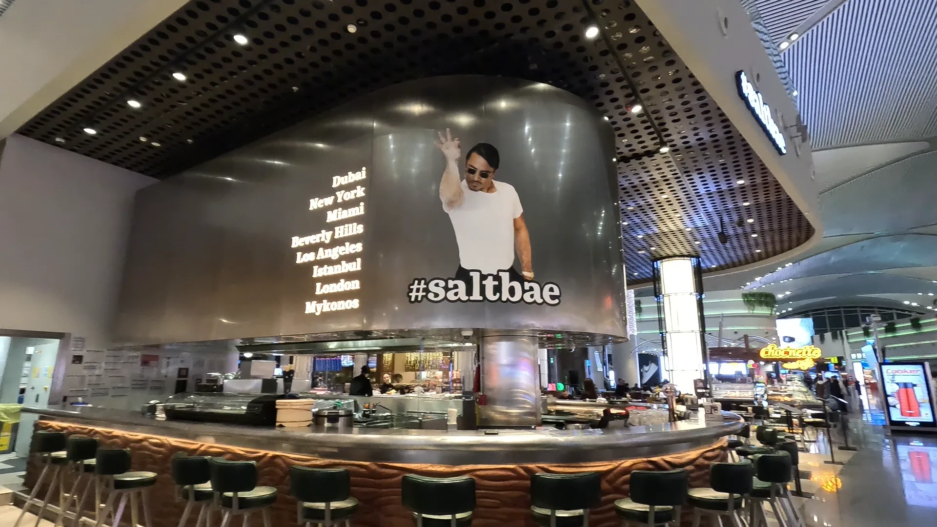 SaltBae restaurant at Istanbul Airport, with an image of Nusret Gökçe doing his renowned salt drop.