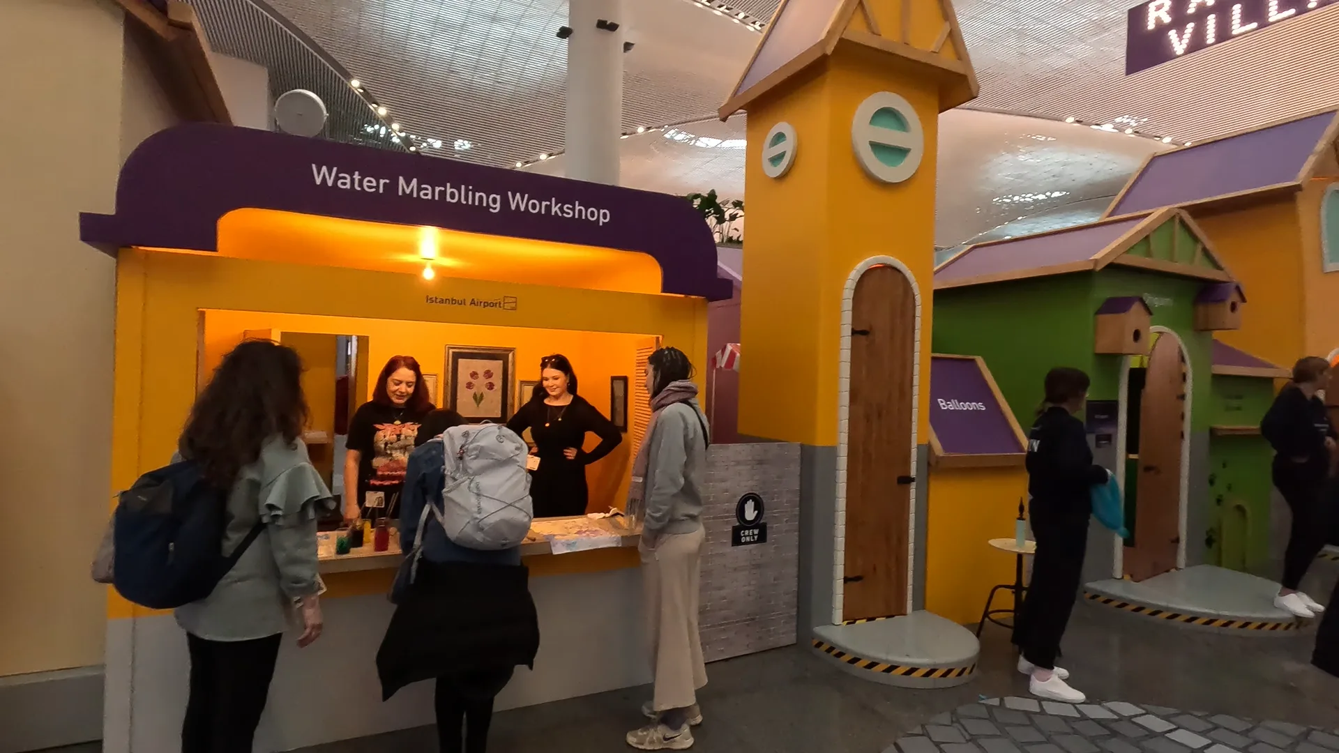Water Marbling Workshop at the Ramadan Village, Istanbul Airport. Visitors learning about the art of water marbling.
